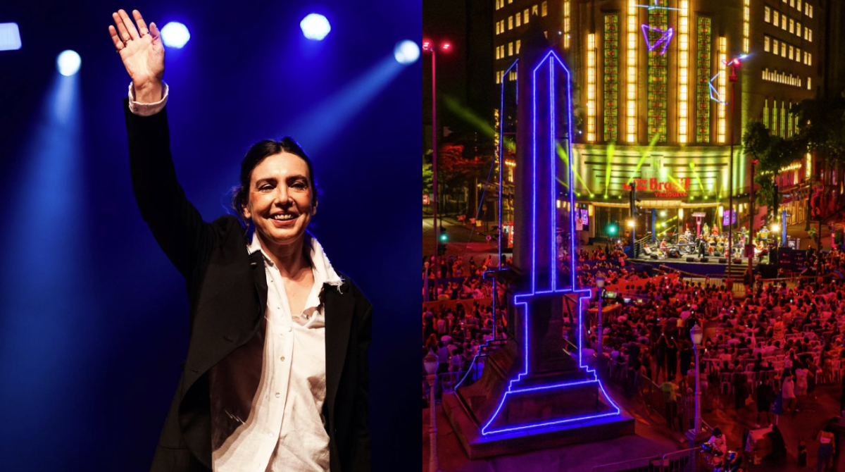 cantora adriana calcanhotto e, ao lado, praça sete iluminada
